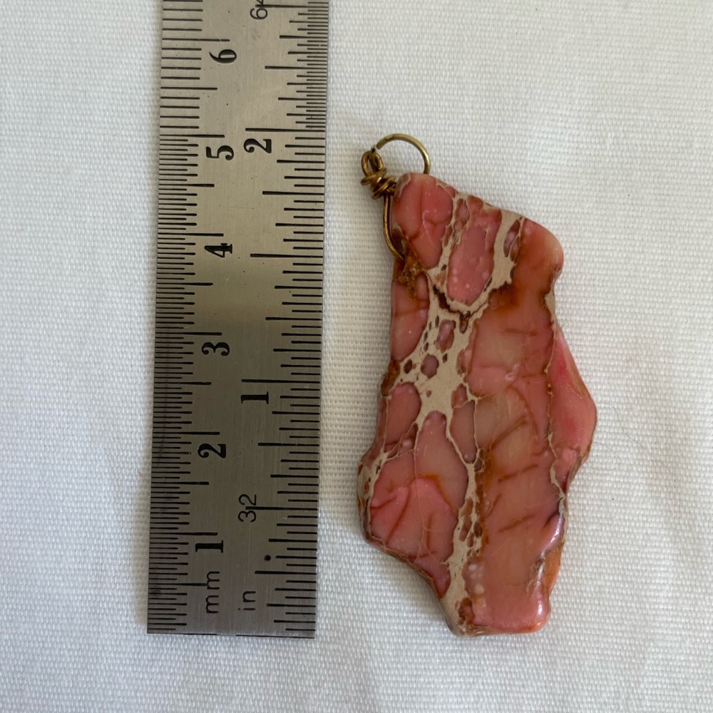 Coral colored pendant